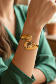 Sculptural Gold Steel Cuff Bracelet