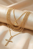 Layered Gold Cross & Sun Charm Necklace