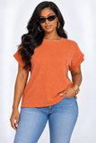 THE OVERSIZED RIBBED TOP